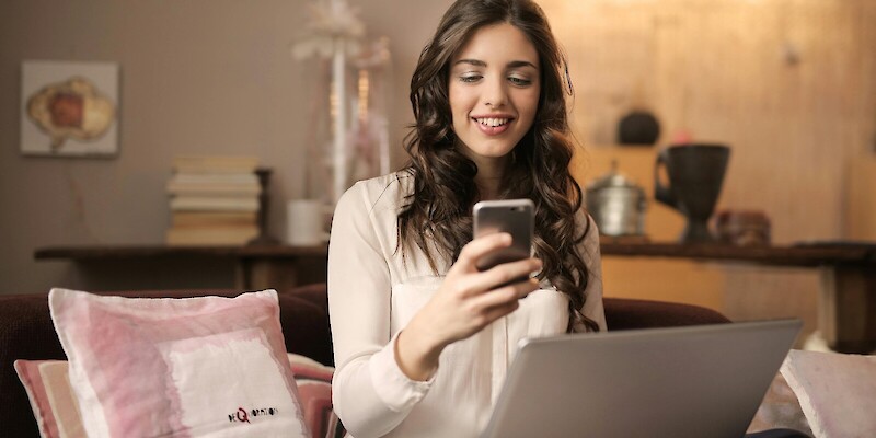 Lady on phone and laptop